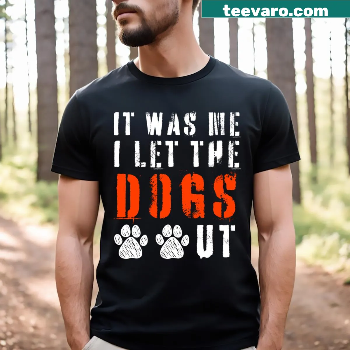 Funny text design t-shirt with 'It Was Me I Let The Dogs Out' — on a men's t-shirt