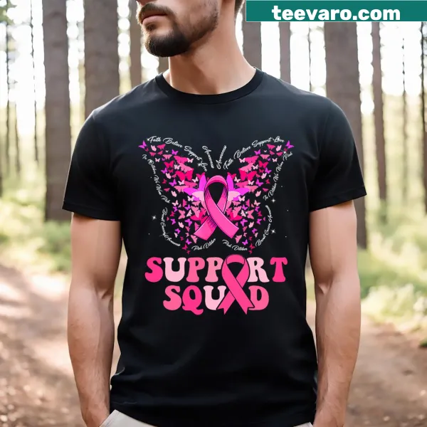 Pink ribbon and butterfly graphic on a breast cancer awareness t-shirt.