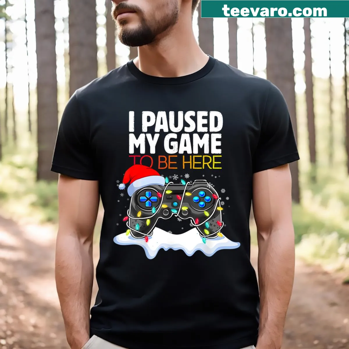 Funny gamer Christmas t-shirt with 'I Paused My Game To Be Here' text — on a men's t-shirt