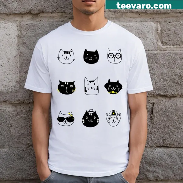 Graphic of various cat faces on a t-shirt