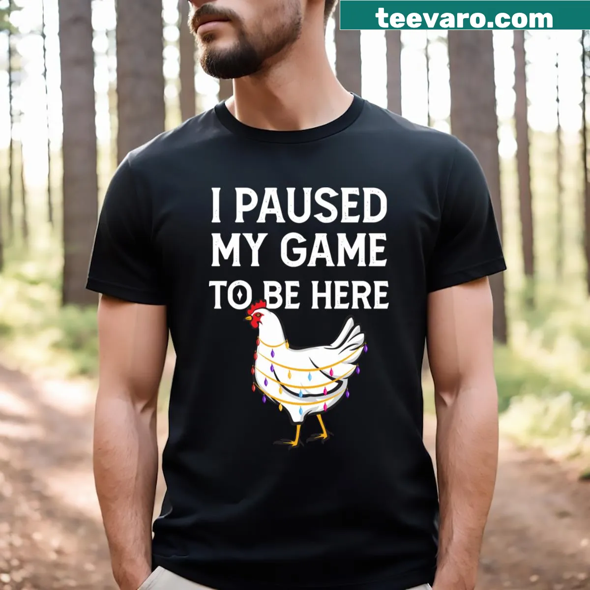 Funny gamer t-shirt with the phrase about pausing a game for Thanksgiving — on a men's t-shirt