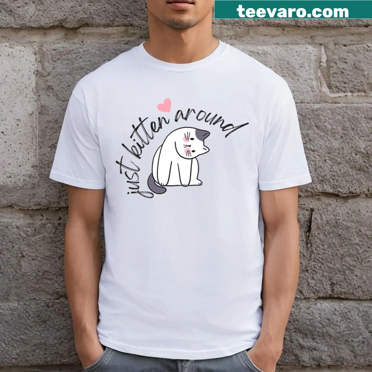 Cartoon kitten t-shirt with playful 'Just Kitten Around' phrase — on a men's t-shirt