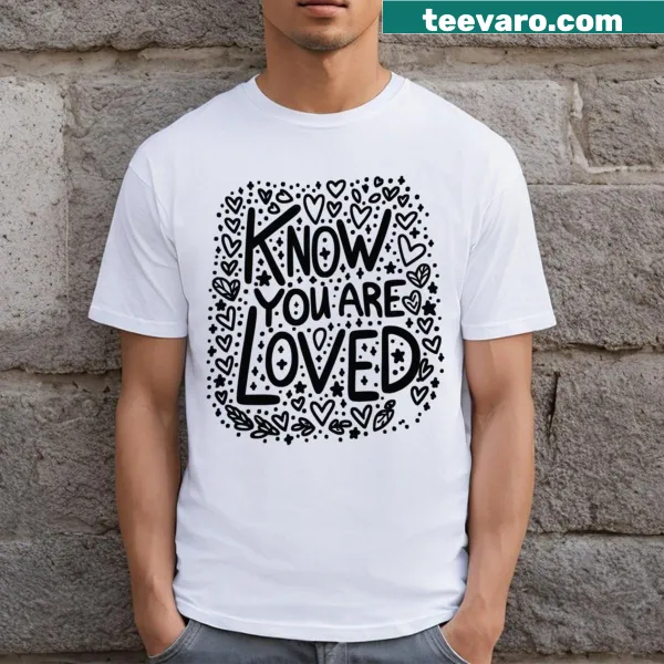 T-shirt featuring 'You Are Loved' with heart graphics