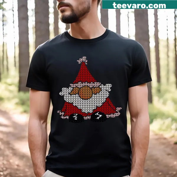 Cartoon Santa Claus design on a kids' Christmas t-shirt.