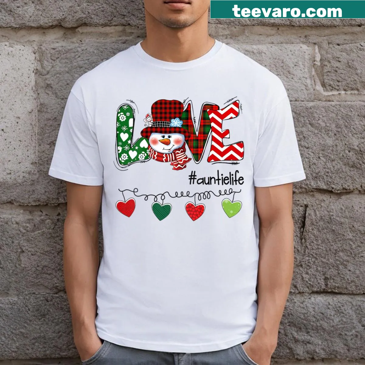 V-neck Christmas tee featuring a snowman and festive text about being an aunt — on a men's t-shirt
