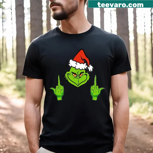 T-shirt featuring graphics inspired by How The Grinch Stole Christmas
