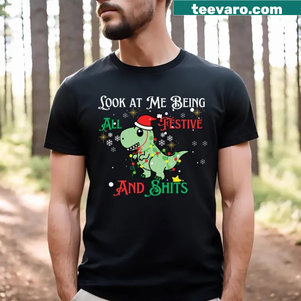 Funny dinosaur graphic T-shirt for kids with festive text