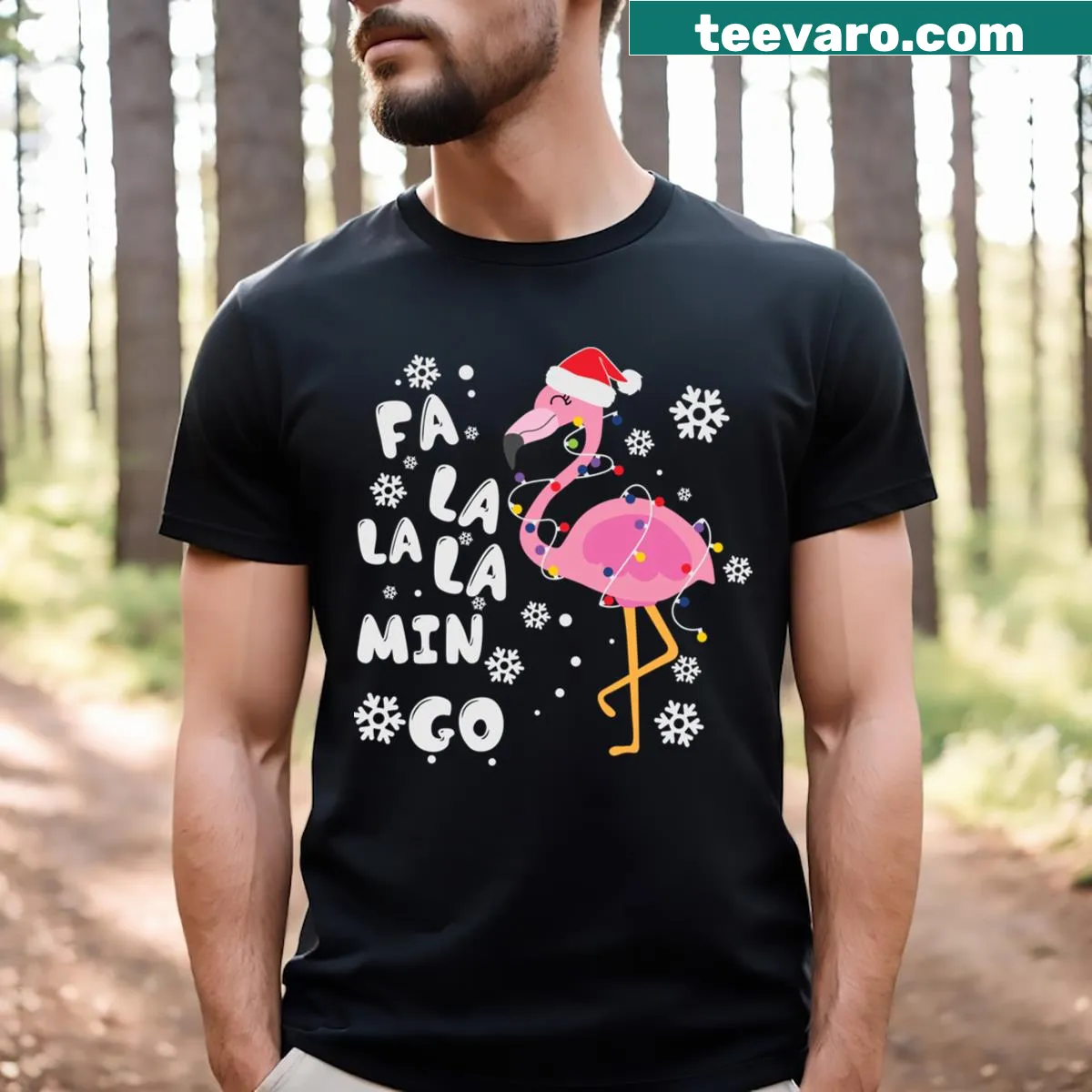 Essential Christmas T-shirt with a whimsical flamingo design — on a men's t-shirt