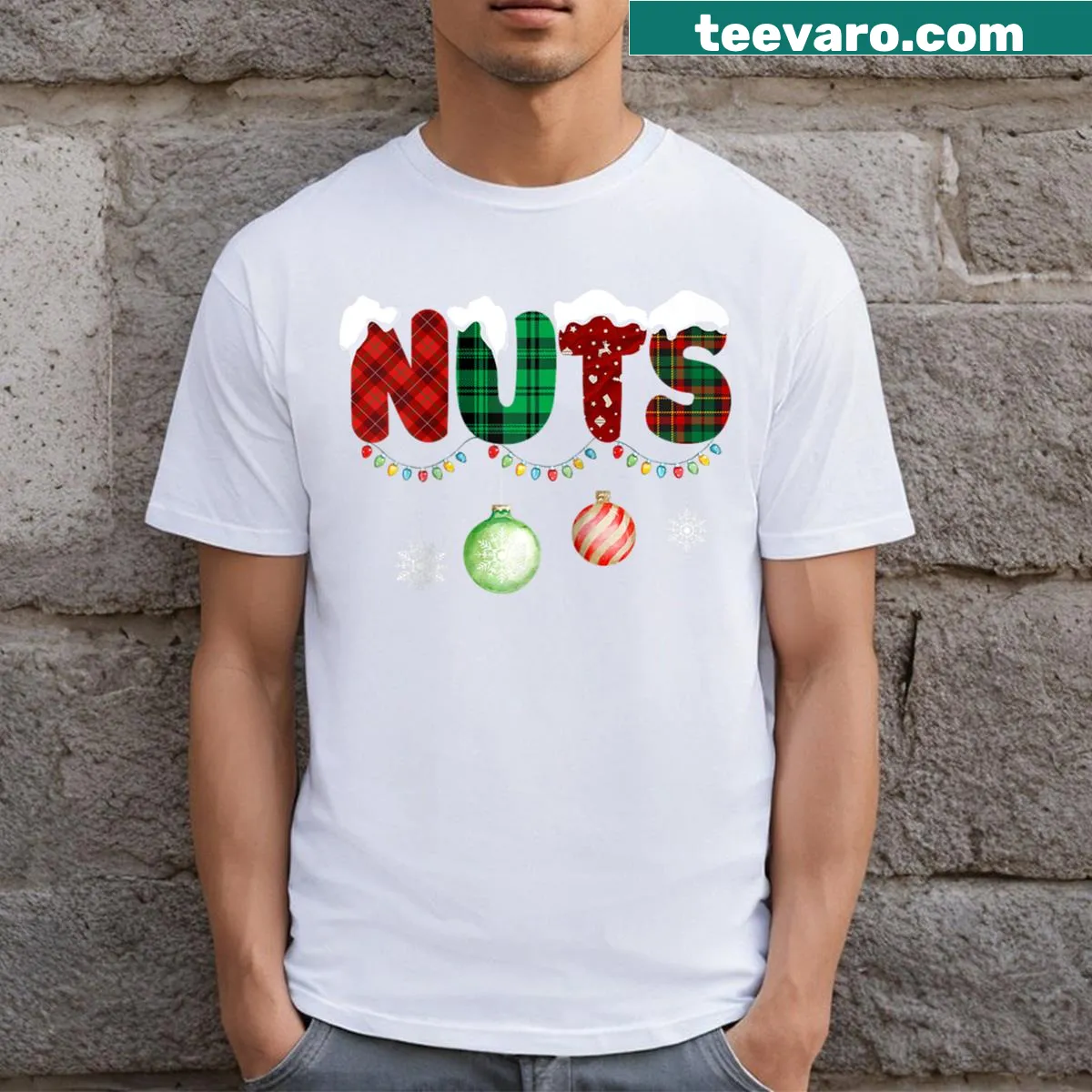 Illustrated funny chestnuts graphic on a Christmas-themed couples raglan tee — on a men's t-shirt