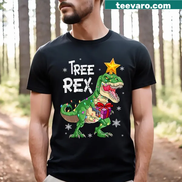 Christmas T-shirt featuring a dinosaur dressed as a Christmas tree