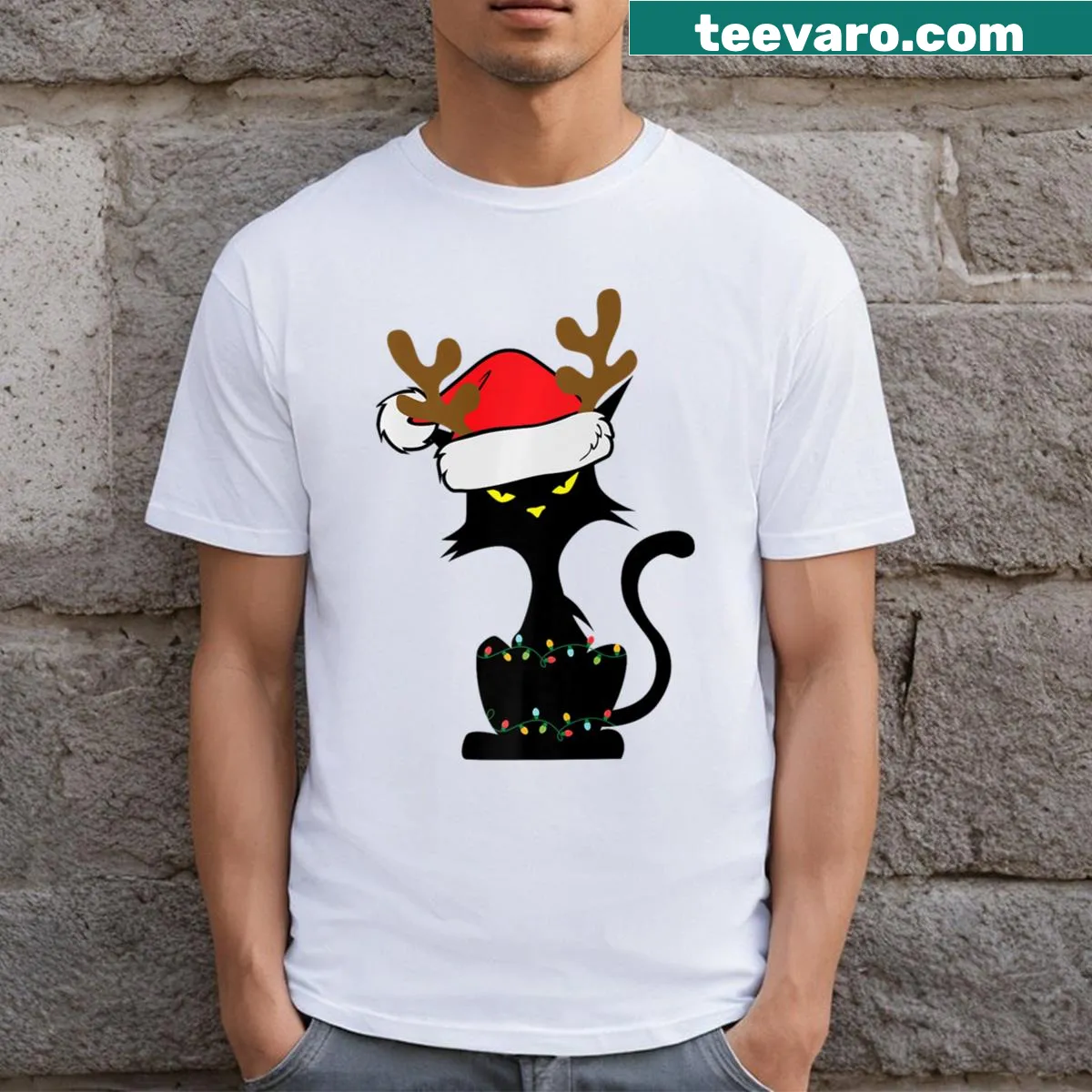 T-shirt featuring a funny black cat in a reindeer hat with Christmas lights. — on a men's t-shirt