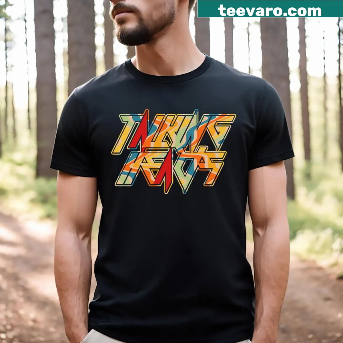 Vintage distressed shirt featuring Talking Heads band graphic. — on a men's t-shirt