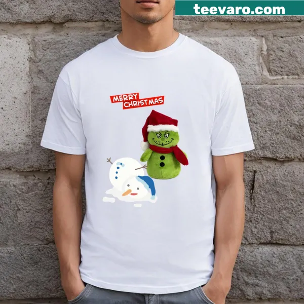 Humorous green snowman graphic t-shirt with dark humor theme