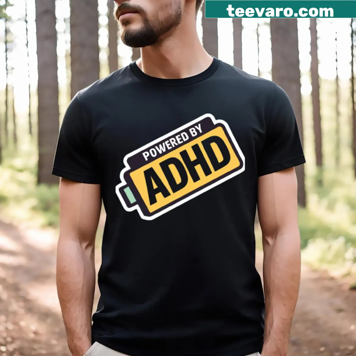 Humorous t-shirt with the phrase Powered By ADHD in bold font — on a men's t-shirt