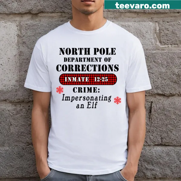 Humorous graphic text about North Pole Corrections Dept on a T-shirt