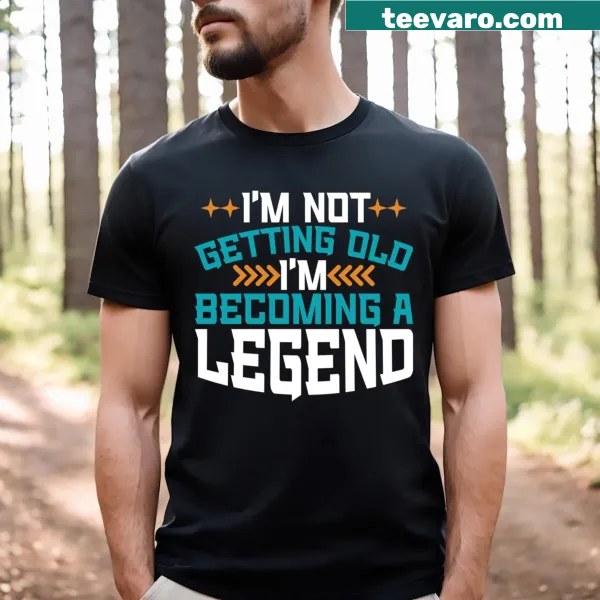T-shirt with text 'I'm Not Old I'm Becoming A Legend' in bold font