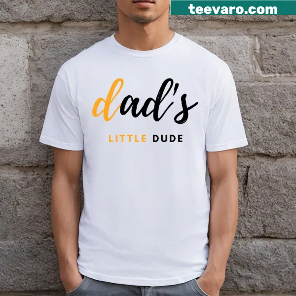 T-shirt with 'Dad's Little Dude' text