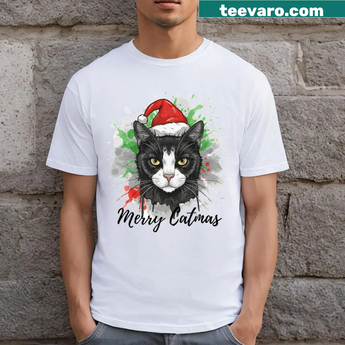 Funny Christmas t-shirt with Merry Catmas text and cat illustration — on a men's t-shirt