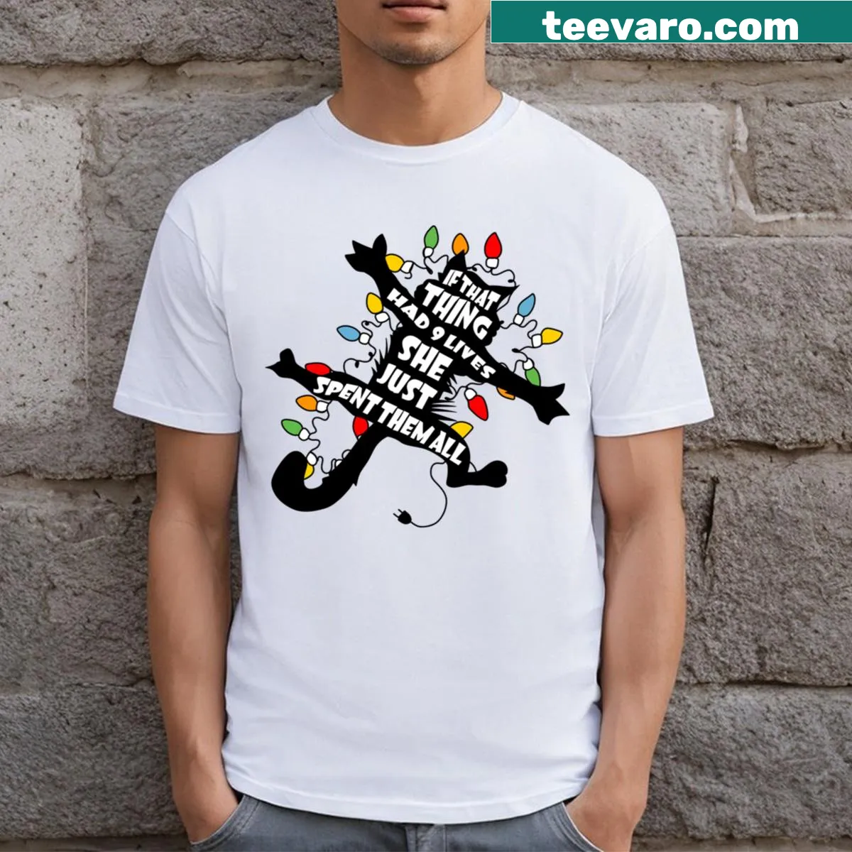Festive t-shirt featuring a playful design about '9 Lives' for cat lovers. — on a men's t-shirt