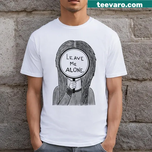 Text graphic reading 'Leave Me Alone' on a t-shirt