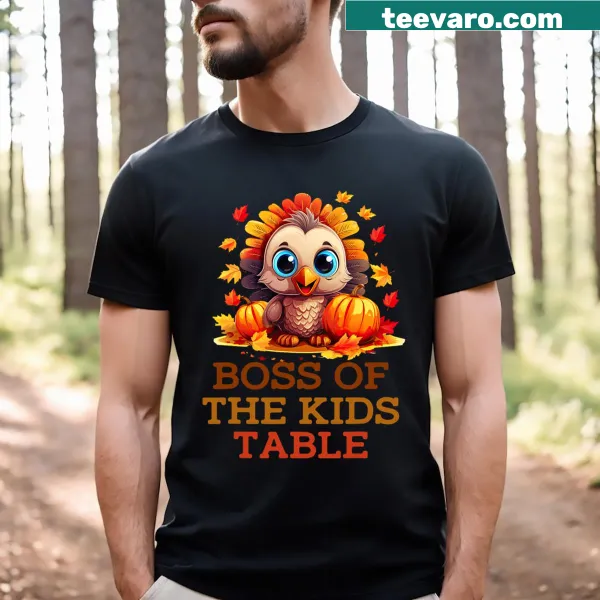 Humorous t-shirt declaring 'Boss of the Kids Table' for Thanksgiving