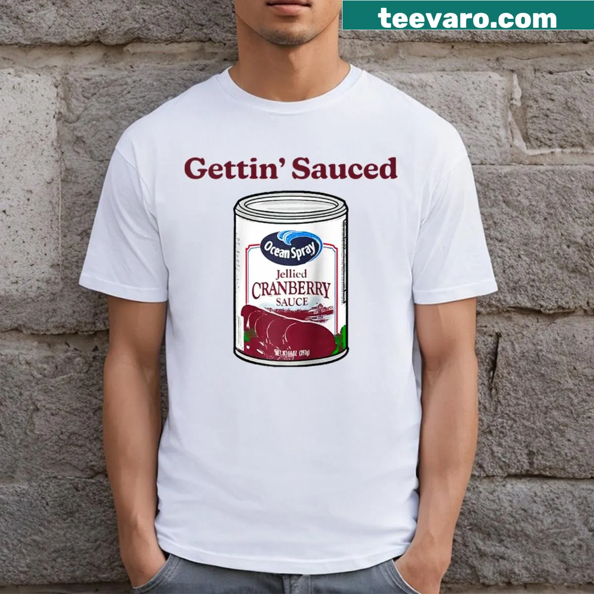 Funny cranberry sauce Thanksgiving t-shirt with 'Getting' Sauced' text — on a men's t-shirt
