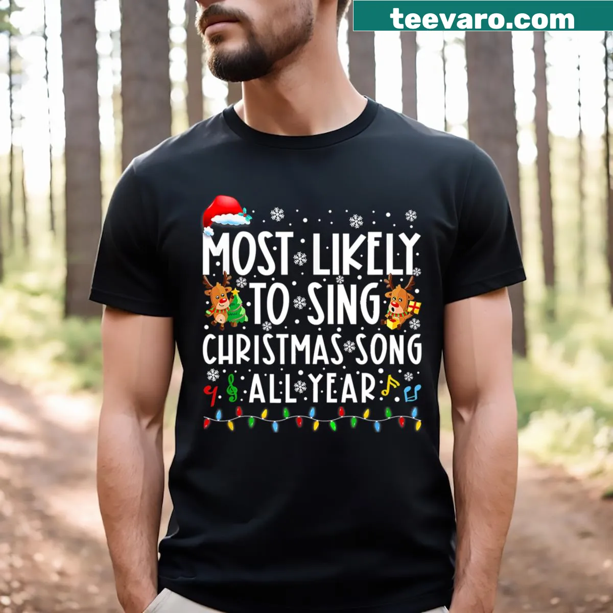 Funny Christmas t-shirt featuring text about singing Christmas songs year-round — on a men's t-shirt