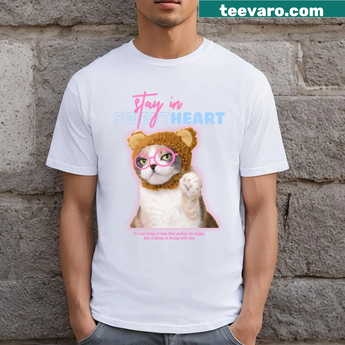 Cute cat illustration on a t-shirt representing warmth and affection. — on a men's t-shirt
