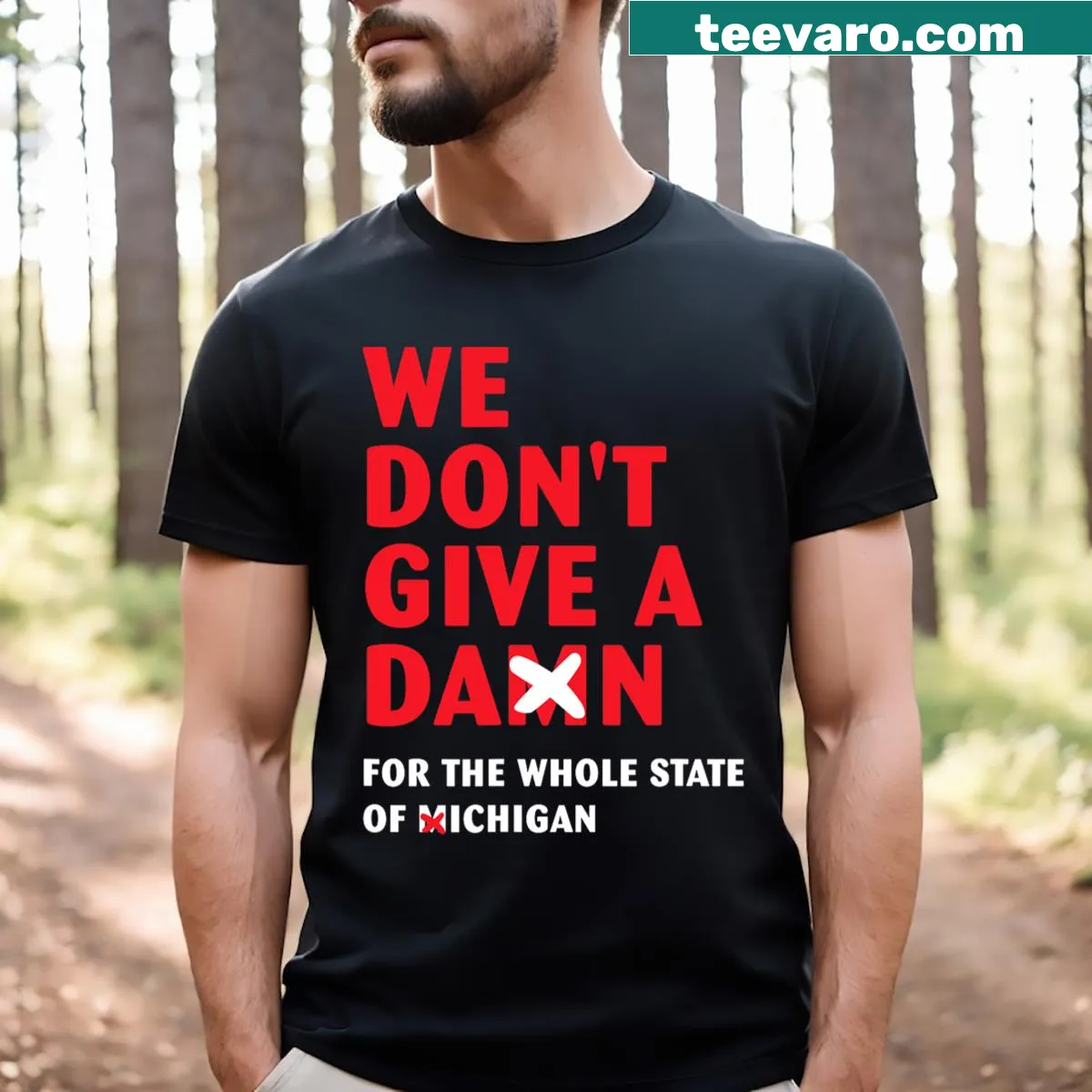Text graphic stating 'We Don't Give A Damn For The Whole State Of Michigan' on a t-shirt — on a men's t-shirt