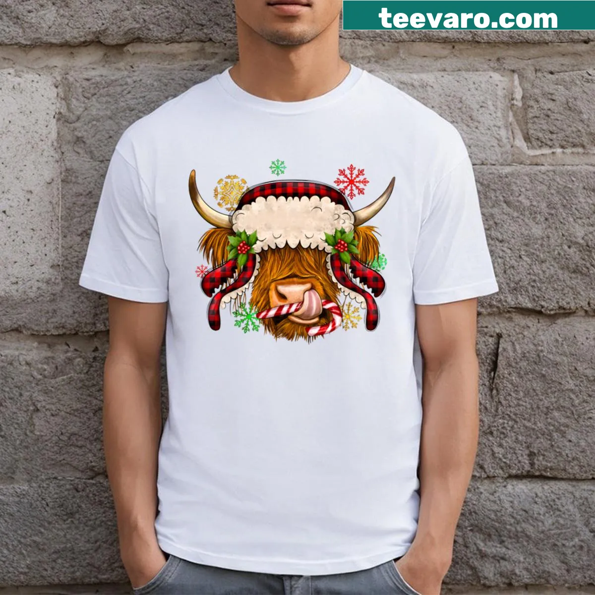 Festive Christmas t-shirt with Highland cow illustration — on a men's t-shirt