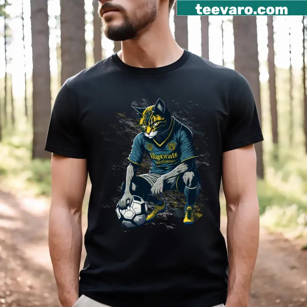 T-shirt featuring a cartoon cat playing soccer