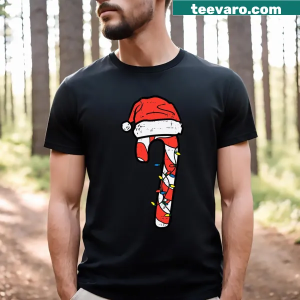 Santa with candy canes illustrated on a Christmas T-shirt.