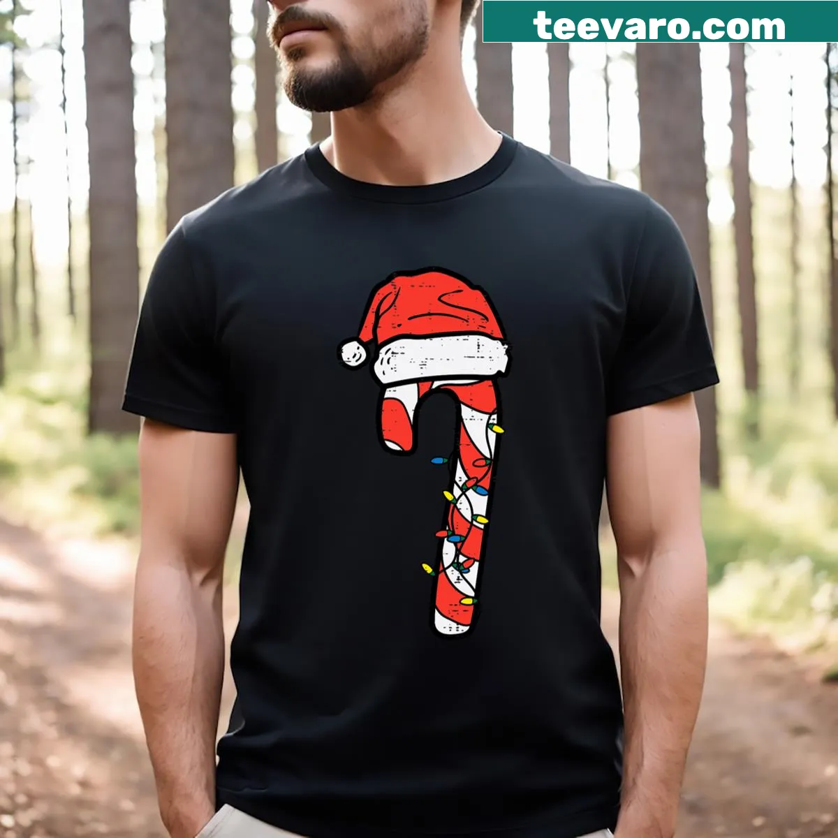 Santa with candy canes illustrated on a Christmas T-shirt. — on a men's t-shirt