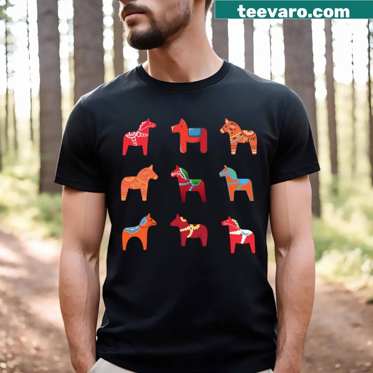 T-shirt featuring a graphic of Swedish Dala horses — on a men's t-shirt