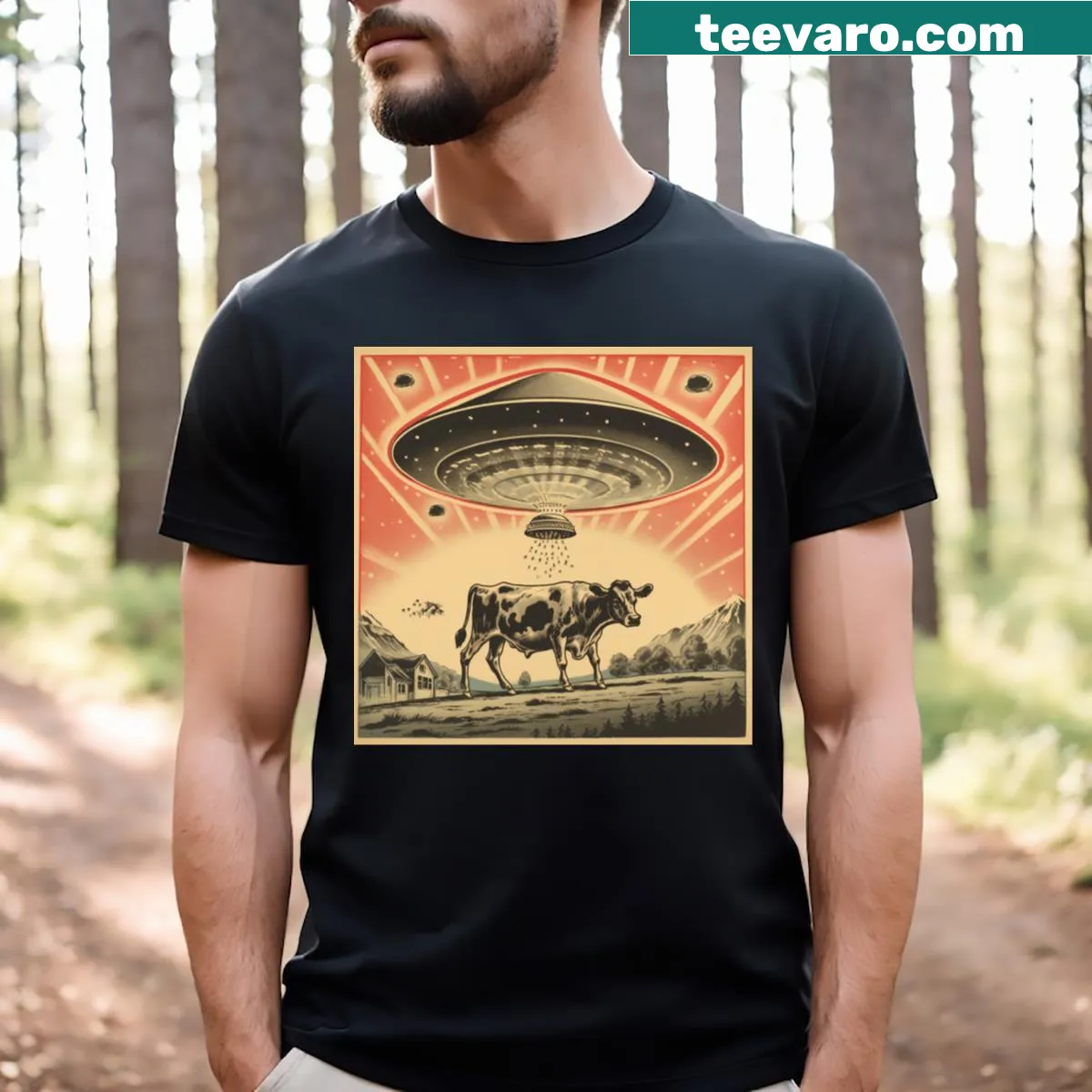 Vintage comic-style UFO and cow encounter graphic t-shirt — on a men's t-shirt