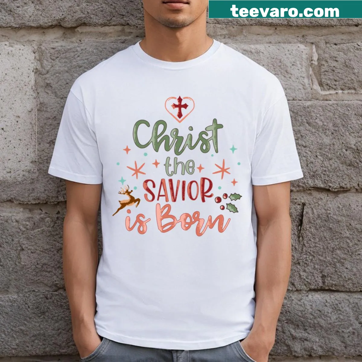 Inspirational Christmas t-shirt with text 'Christ The Savior Is Born' — on a men's t-shirt