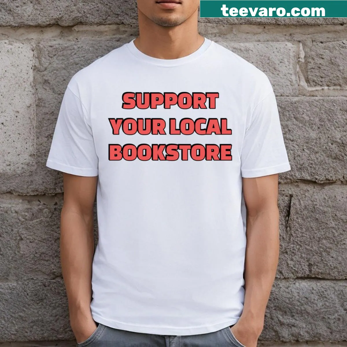 Support Your Local Bookstore text graphic on the t-shirt. — on a men's t-shirt