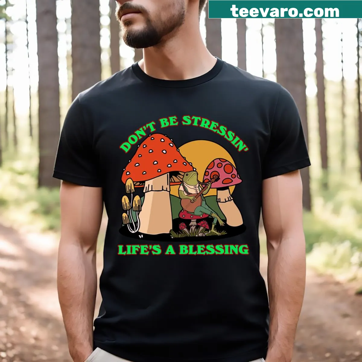 Cartoon frog playing banjo on a mushroom with cottagecore style — on a men's t-shirt