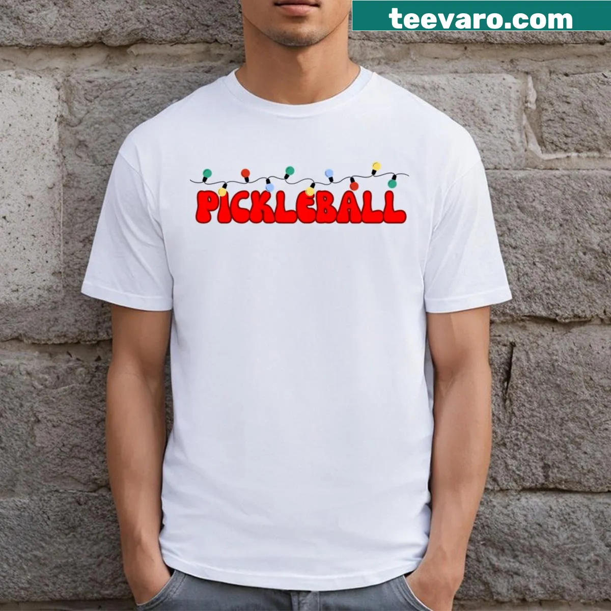 Funny Christmas t-shirt featuring pickleball theme and festive graphics — on a men's t-shirt