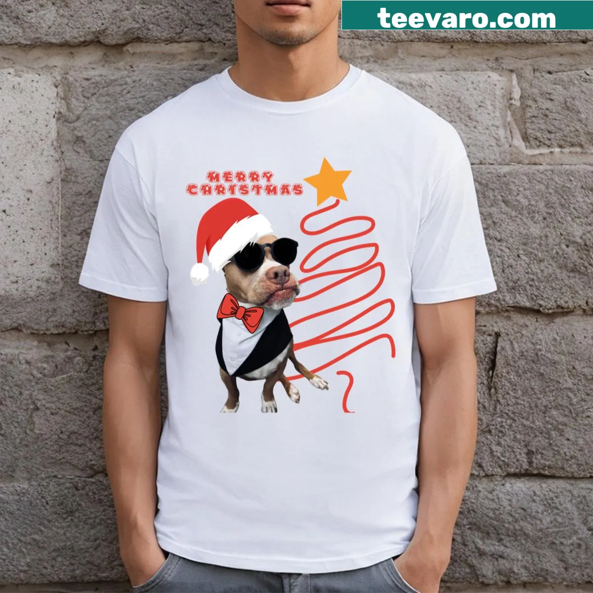 Cute Christmas t-shirt featuring a pitbull in a Santa hat by a Christmas tree — on a men's t-shirt