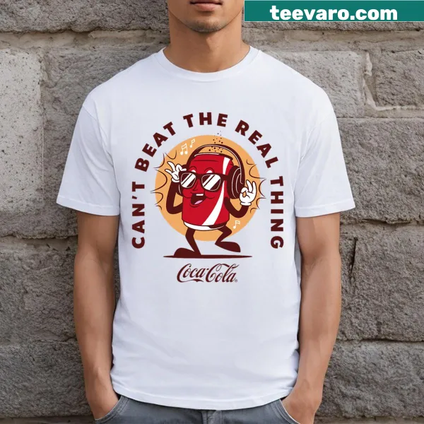 Vintage Coca-Cola cartoon logo on a T-shirt