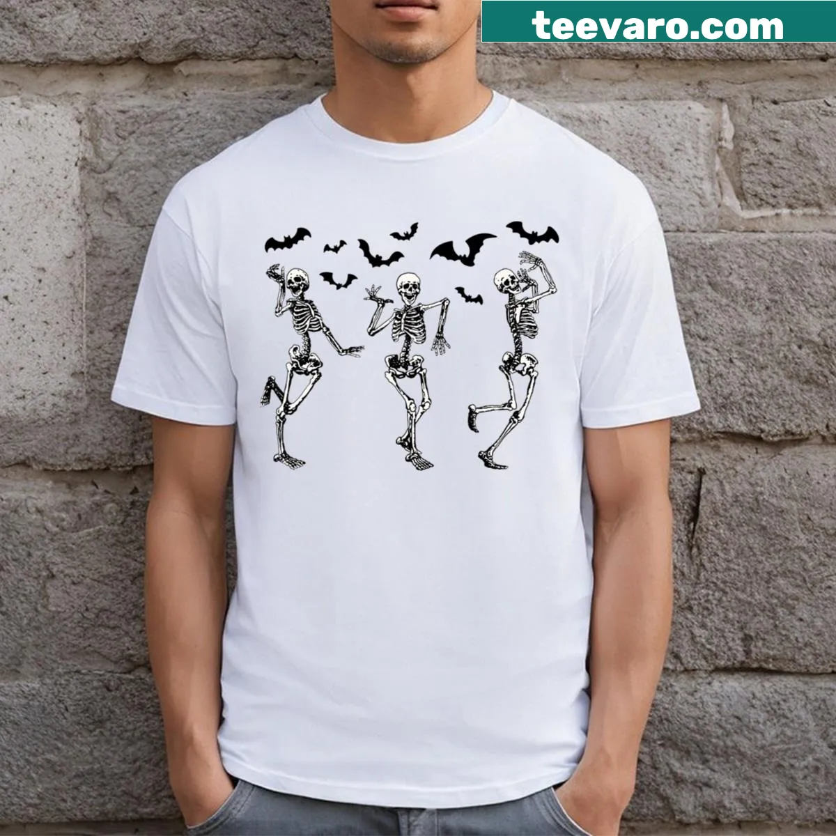 Cartoon Halloween shirt with dancing skeletons and bats — on a men's t-shirt