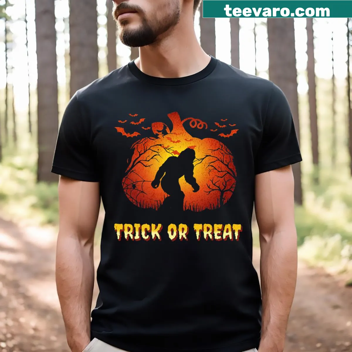 Halloween T-shirt featuring Bigfoot and a Jack O Lantern — on a men's t-shirt