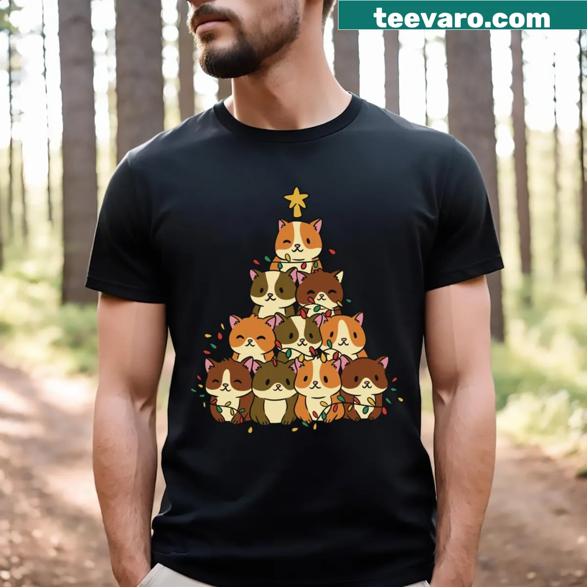 Cute cartoon cat and Christmas tree graphic t-shirt — on a men's t-shirt