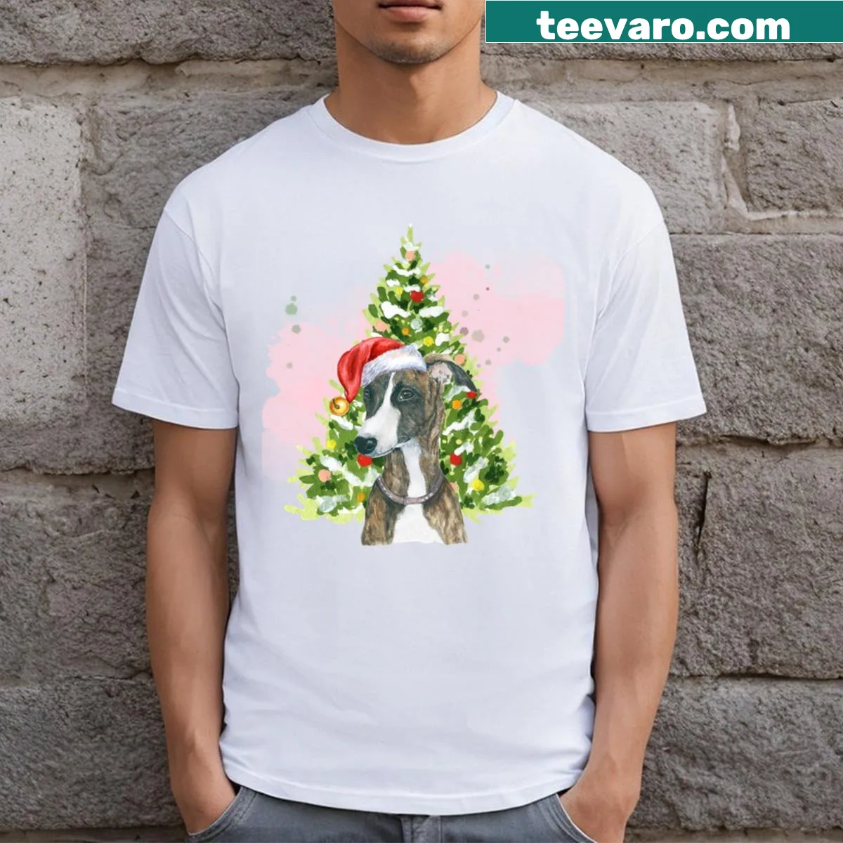 Christmas-themed T-shirt with a whippet and Christmas tree illustration — on a men's t-shirt