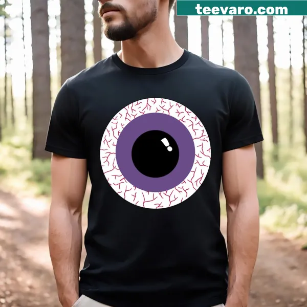 Quirky shirt with playful eye ball graphics and humorous text.