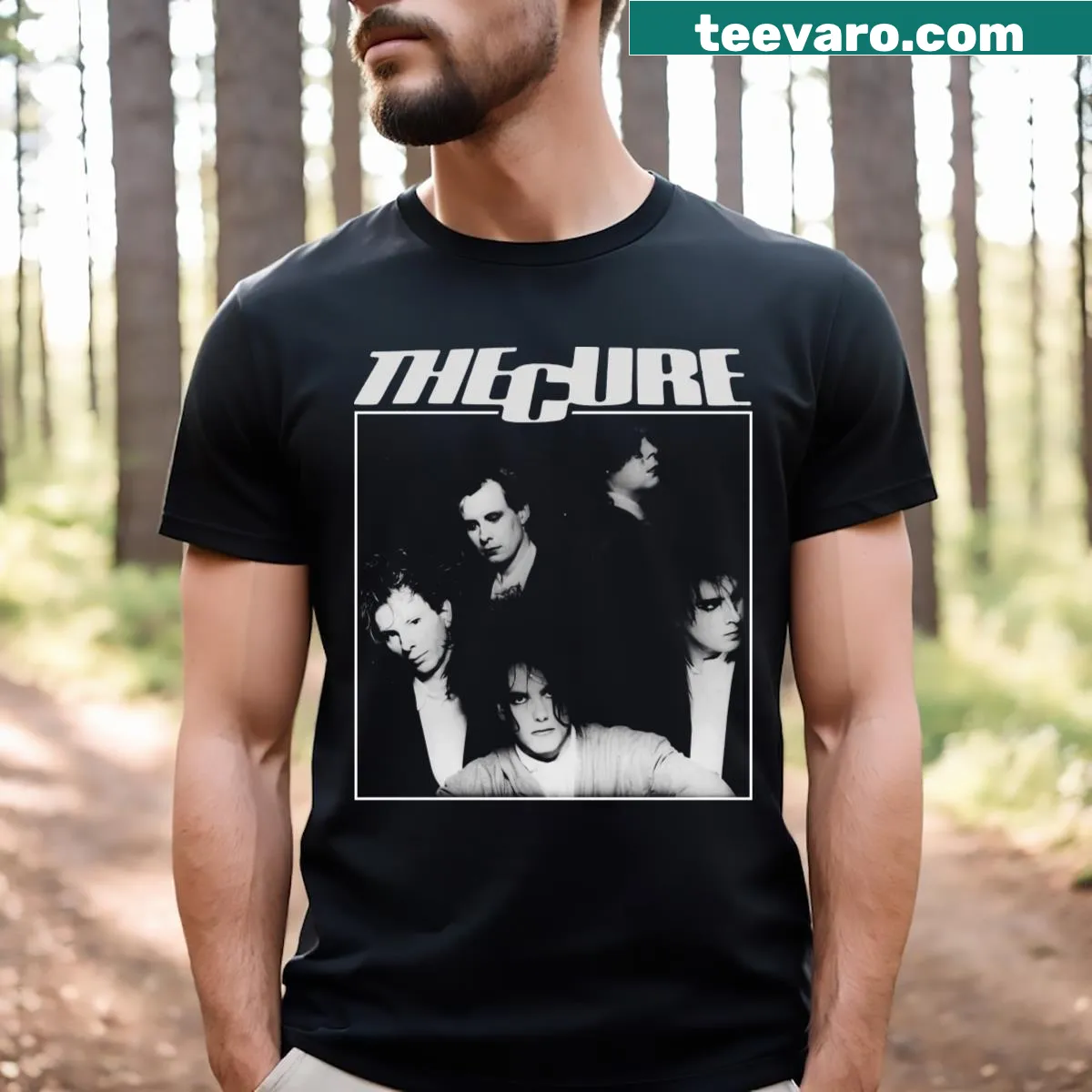 Distressed vintage-style t-shirt featuring The Cure band logo — on a men's t-shirt
