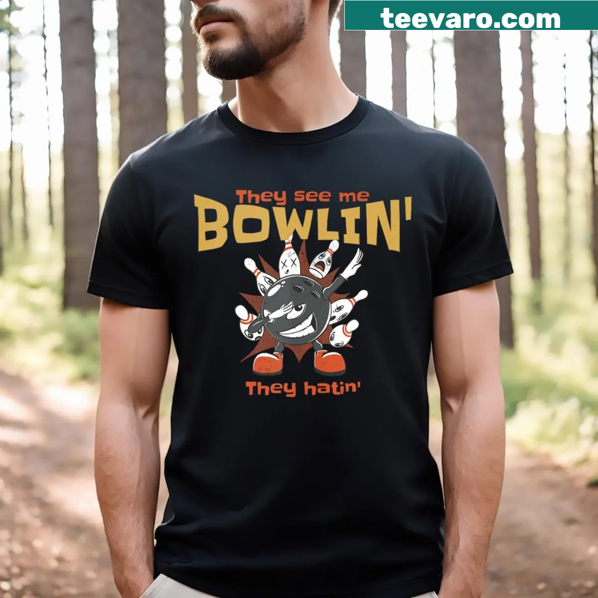 Playful bowling t-shirt with the phrase 'They See Me Bowlin' They Hatin'' — on a men's t-shirt