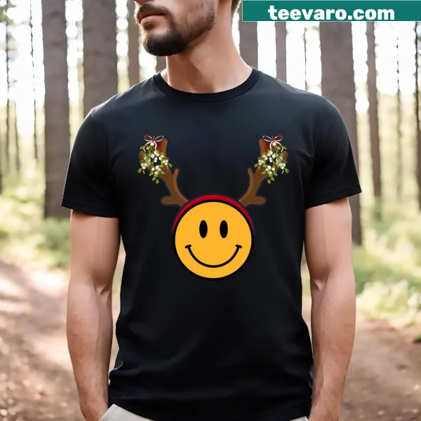 Cartoon Reindeer T-shirt with mistletoe and smiley face for Christmas