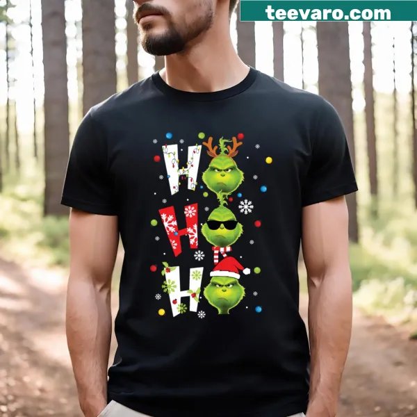 Whimsical Grinch illustration on a festive Christmas T-shirt.